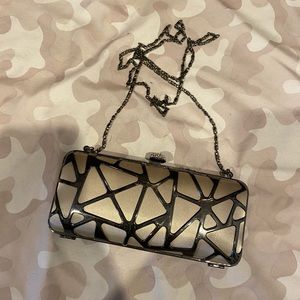 Silver metallic clutch